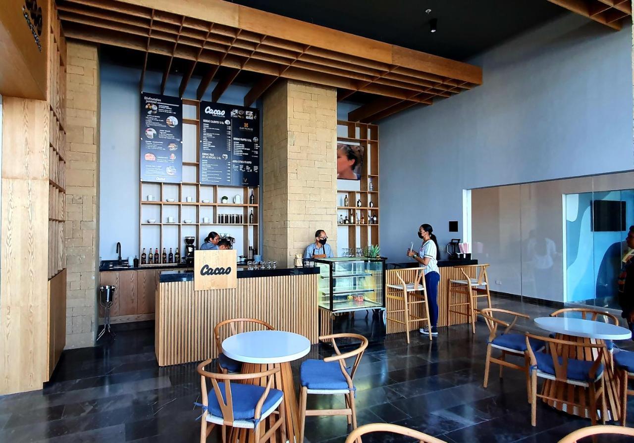 Viaggio Resort Mazatlán Eksteriør billede Interior of a Starbucks Reserve store in Ho Chi Minh City, Vietnam